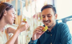 A woman and a man enjoying the Vermont Best Restaurants.