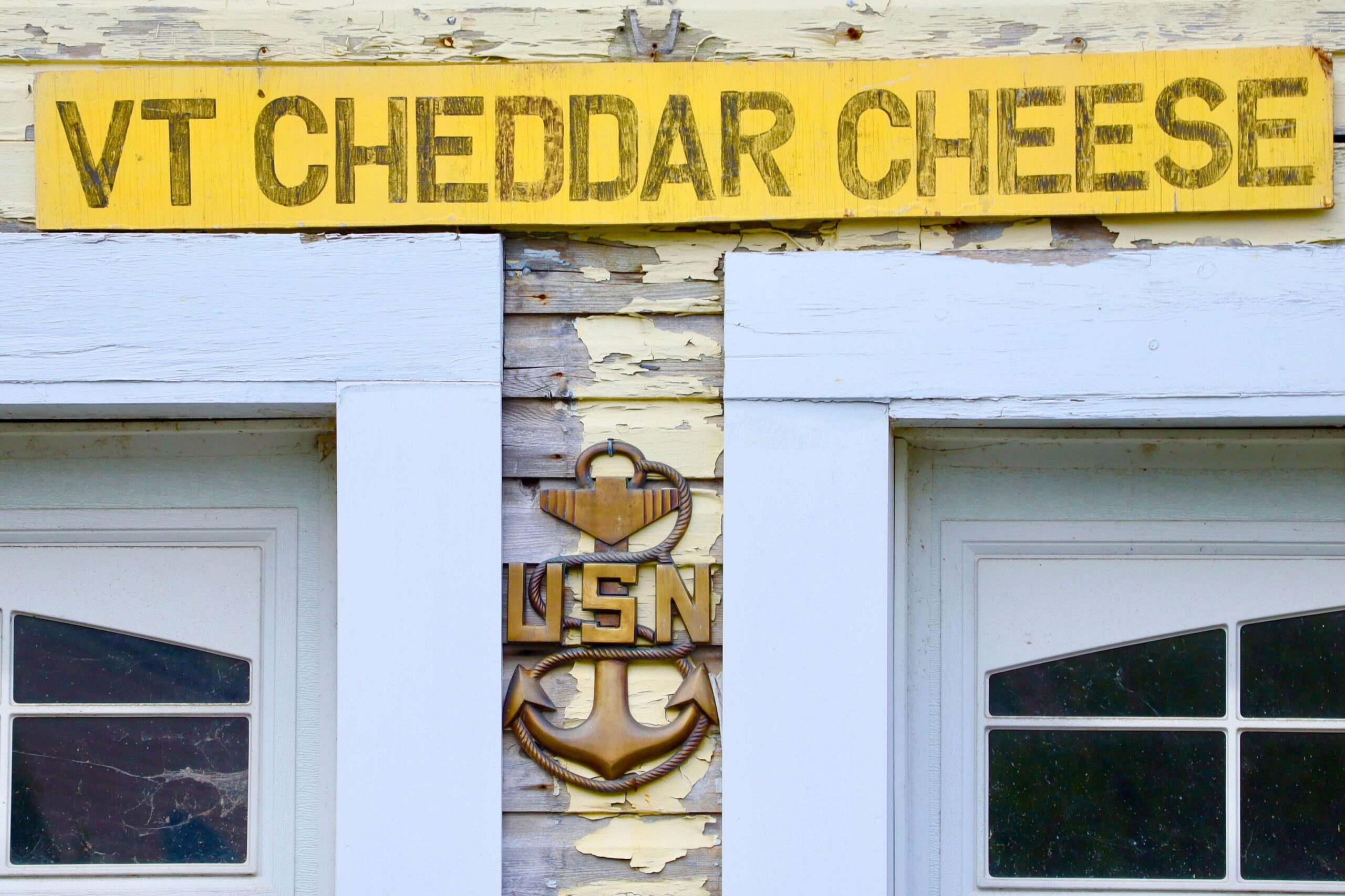 A sign advertising Vermont Cheese.